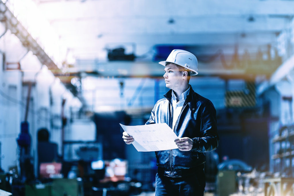 Man with white helmet at work